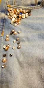 Embellished step-hem distressed jeans in light wash by AQUA