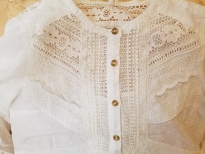 The detail of the lace patterns on this Anthropoglogie top.