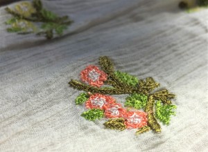 Flower embroidery details on Botanical Peasant Top by Ranna Gill from Anthropologie