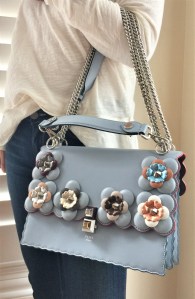 Blue bag with flower embellishments with multi straps by Fendi