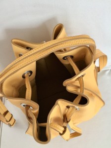 Top view of ZARA yellow bucket bag